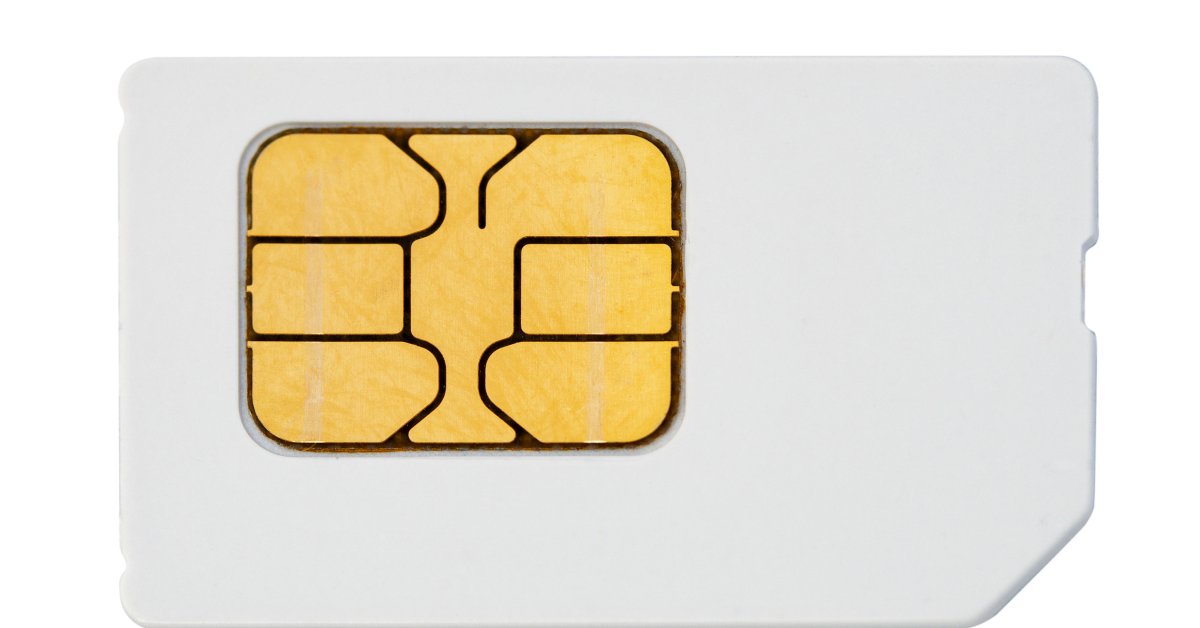 A large SIM card in front of a white background. The card is mostly white except for a gold chip in the middle.